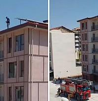 Malatya'da TOKİ şantiyesinde parasını alamayan işçi çatıya çıktı!