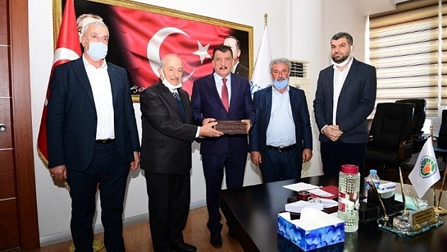 Muhtarlarla buluştu