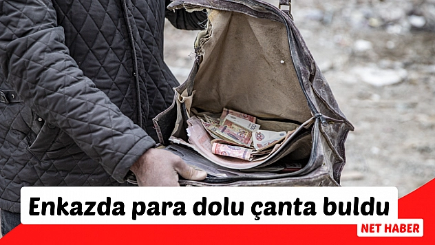 Enkazda para dolu çanta buldu