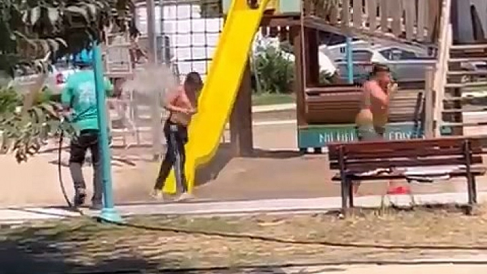 Beton mikserinin altında duş alıp, tazyikli tabanca ile yıkandılar