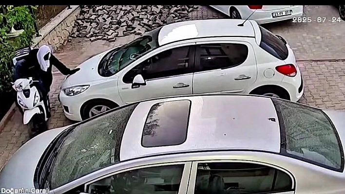 Kafasına atlet ve kask geçirerek hırsızlık girişiminde bulundu