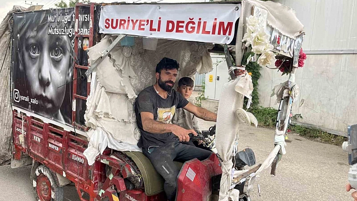 Suriyeli sanılmaktan korktu, motosikletine yazdı: