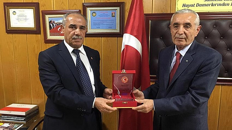 Evren'e plaket 