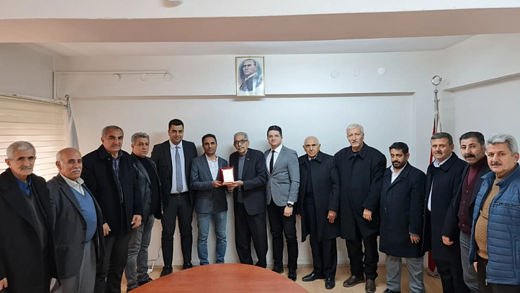 Muhtarlardan teşekkür plaketi