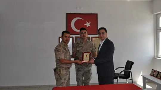 Plaket verildi